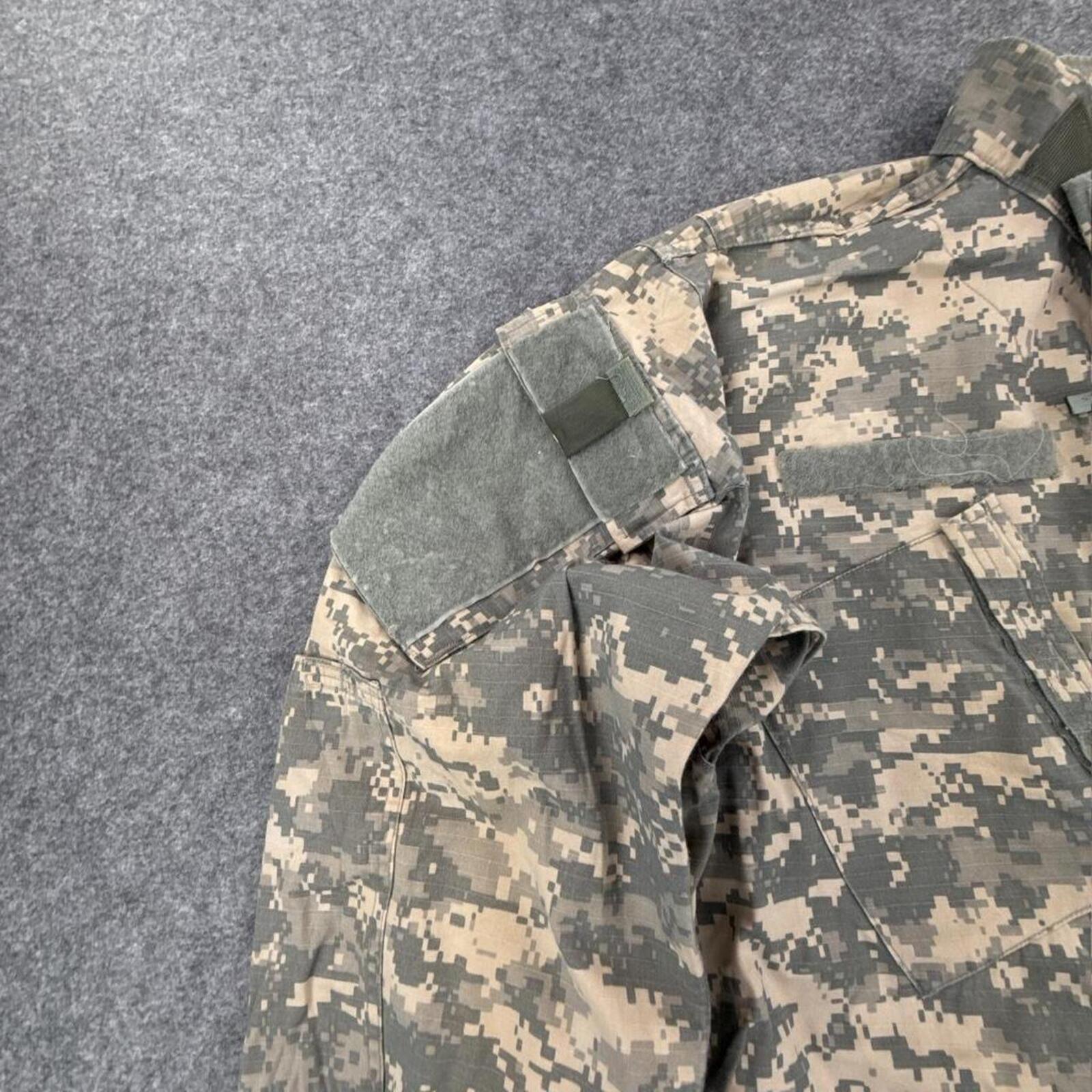 Khaki and green camouflage button-up shirt with multiple pockets #camouflage