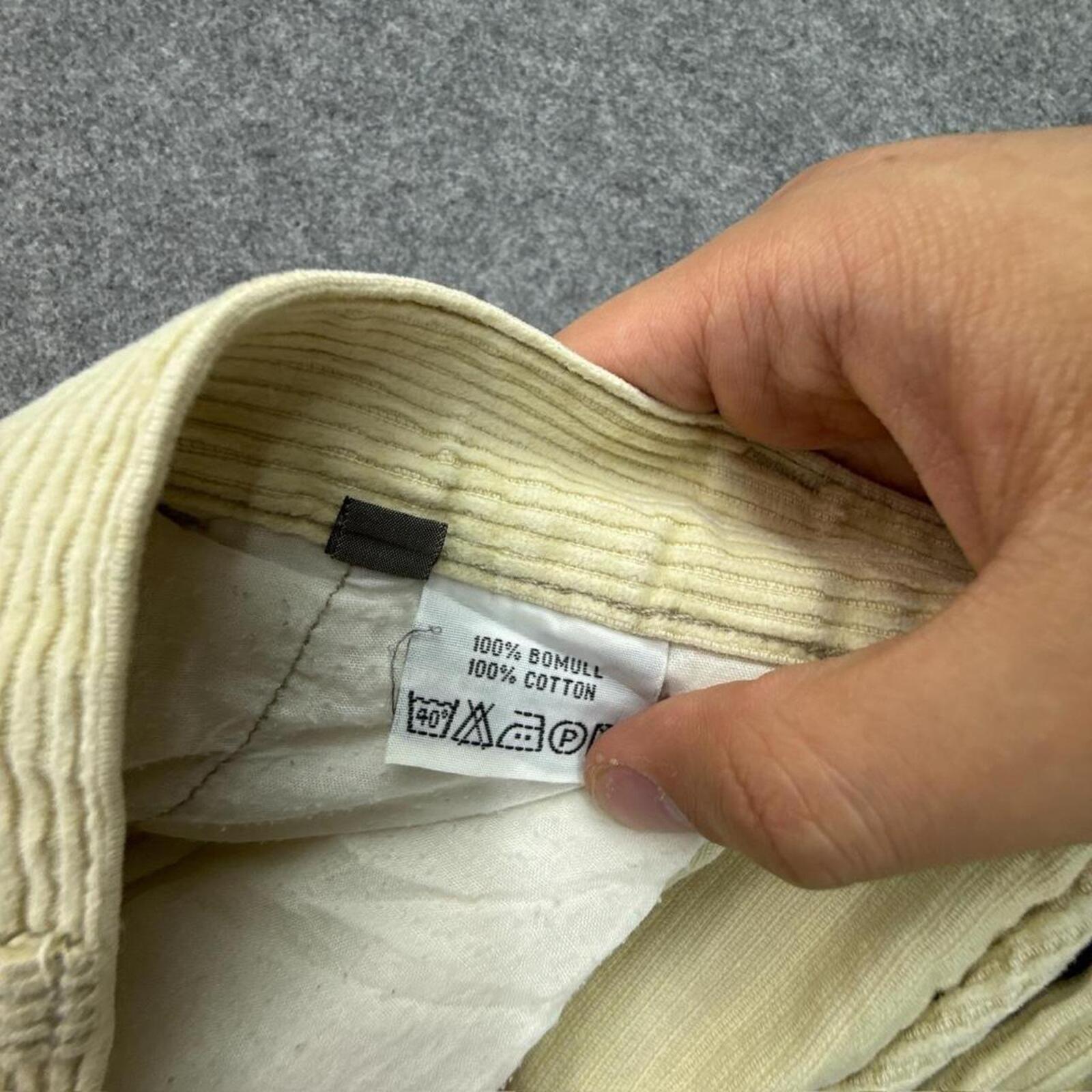 Cream corduroy straight leg trousers