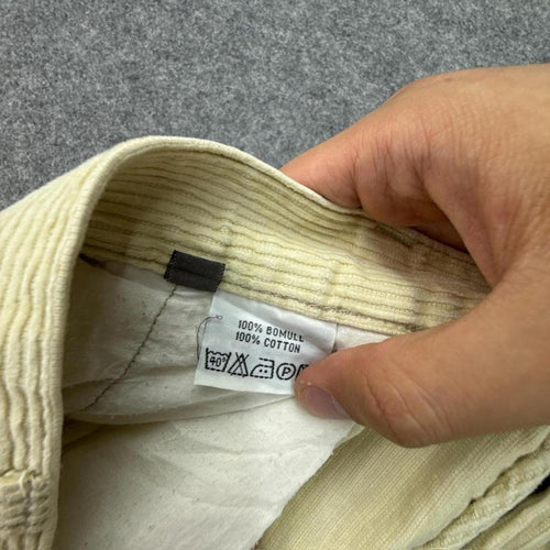 Cream corduroy straight leg trousers