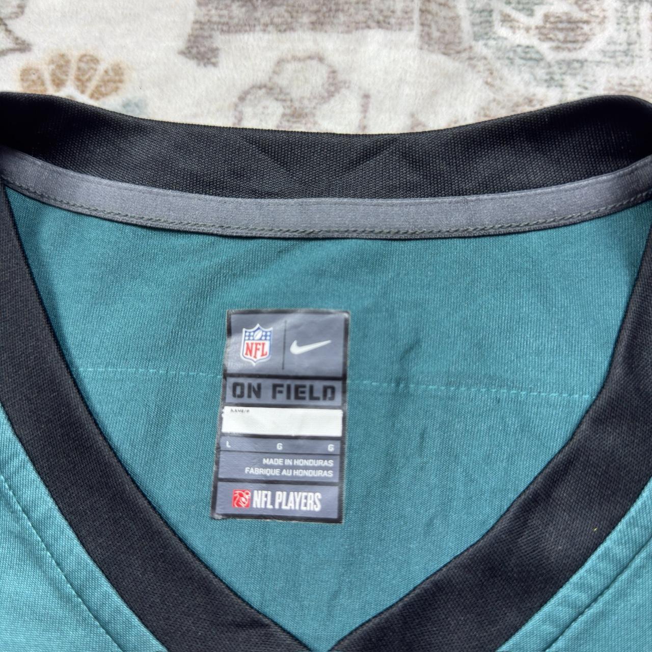 Nike NFL Women’s Vick Jersey in Teal Size L