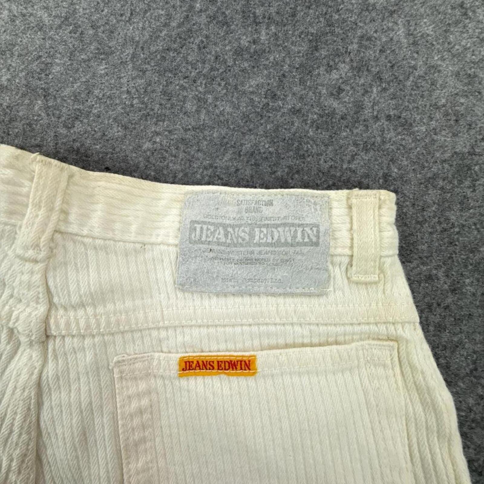 White corduroy straight leg trousers