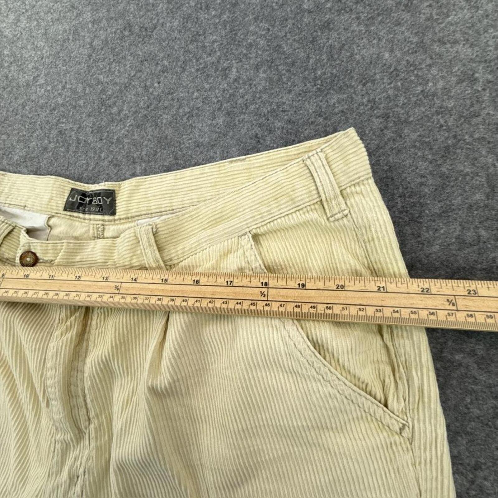 Cream corduroy straight leg trousers