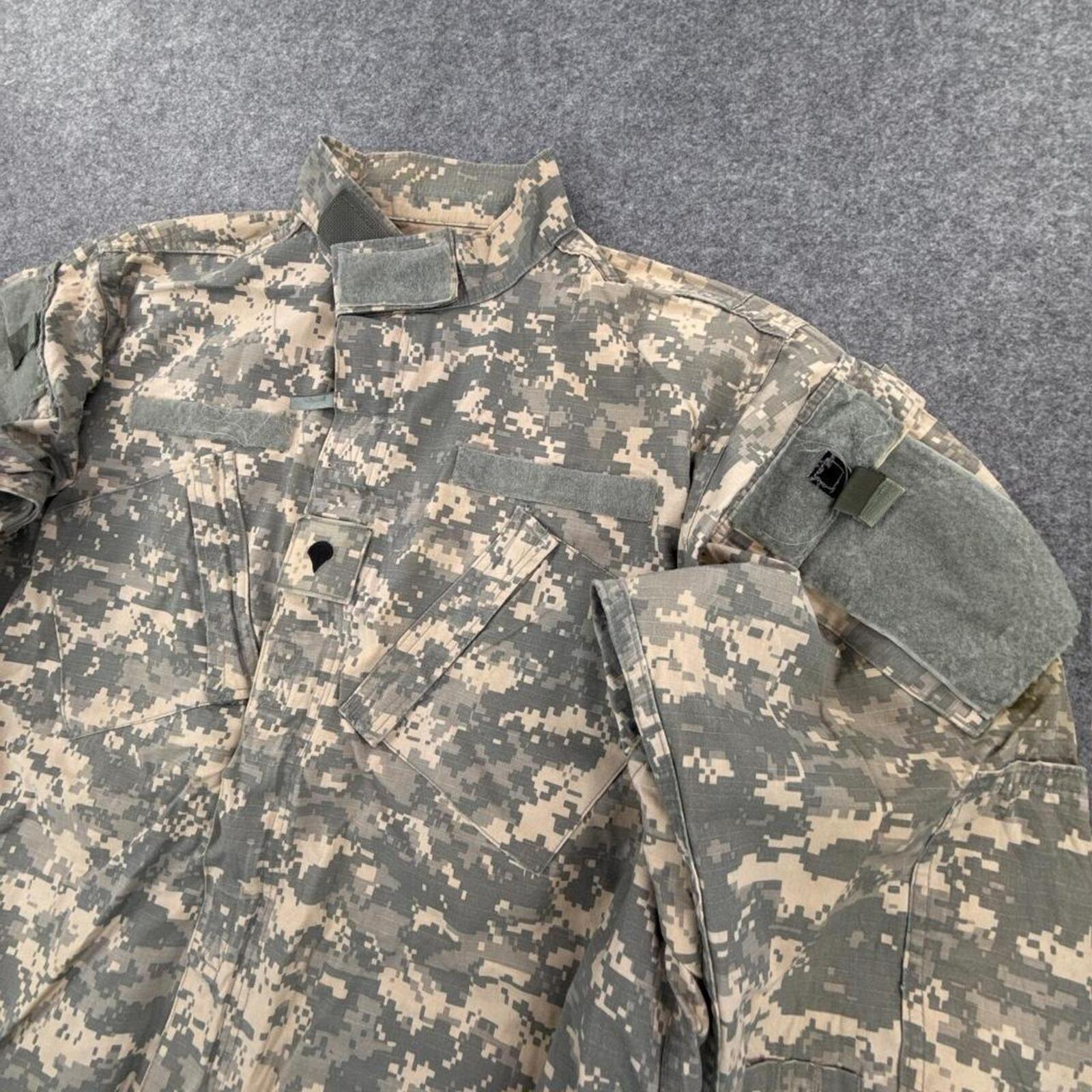 Khaki and green camouflage button-up shirt with multiple pockets #camouflage