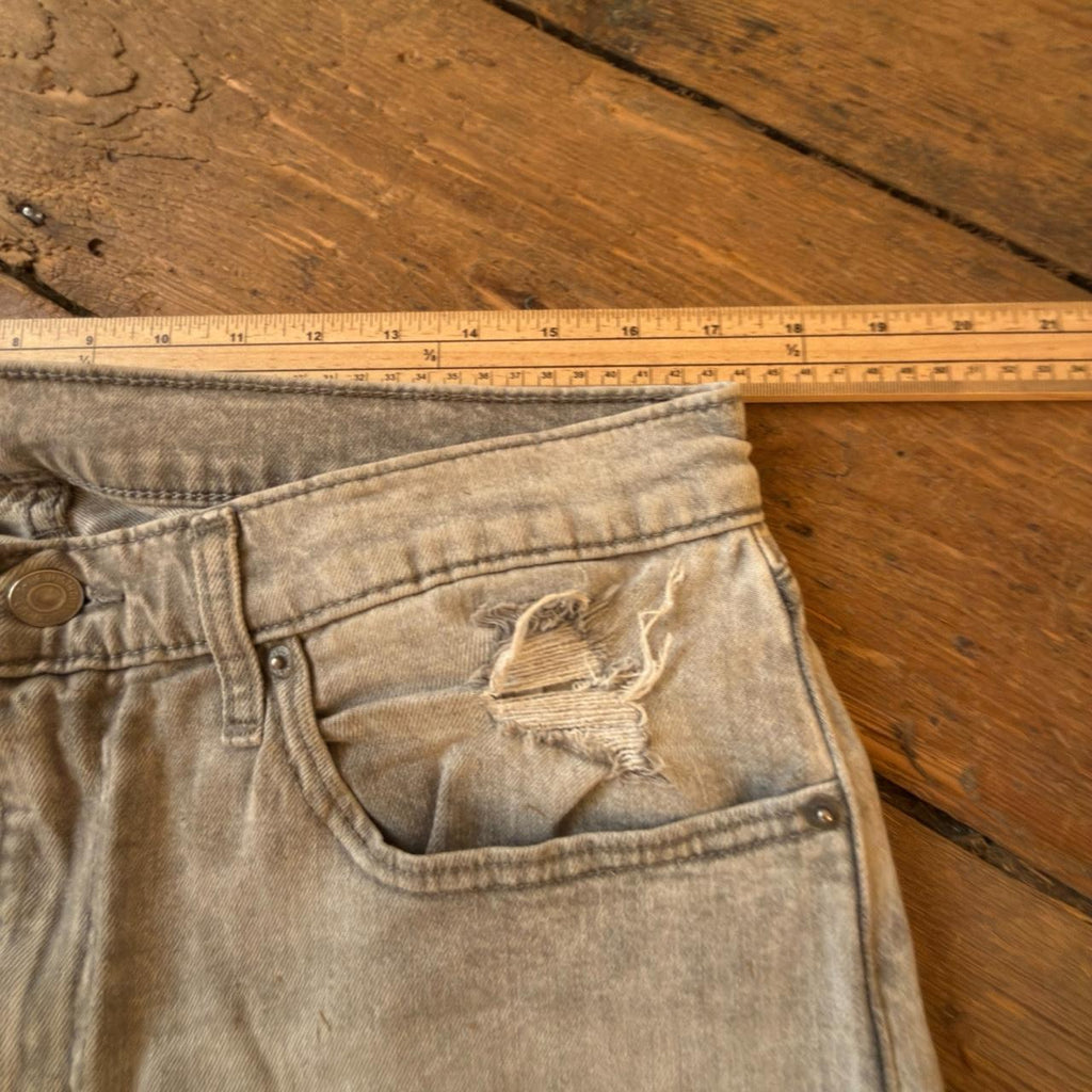 Levi's 512 Light Wash Distressed Jeans with Frayed Hem W34 L29