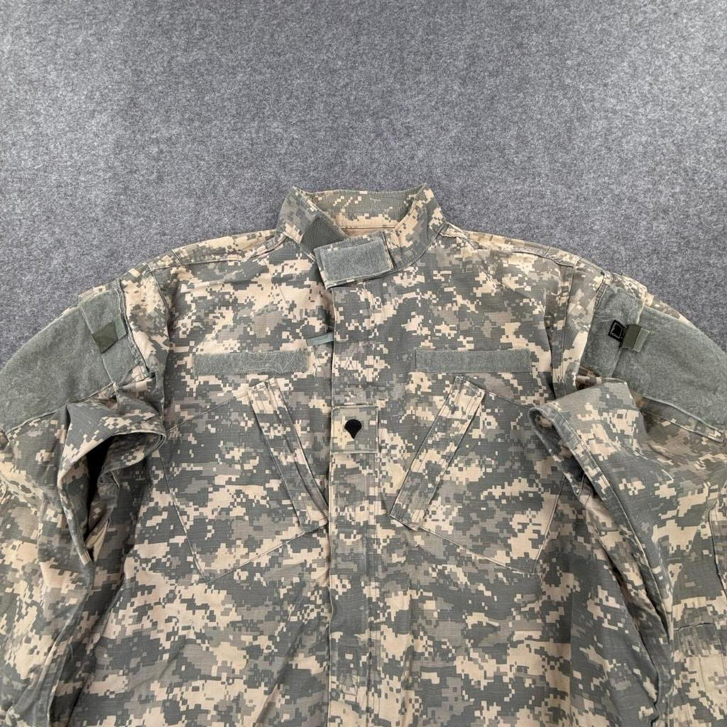 Khaki and green camouflage button-up shirt with multiple pockets #camouflage