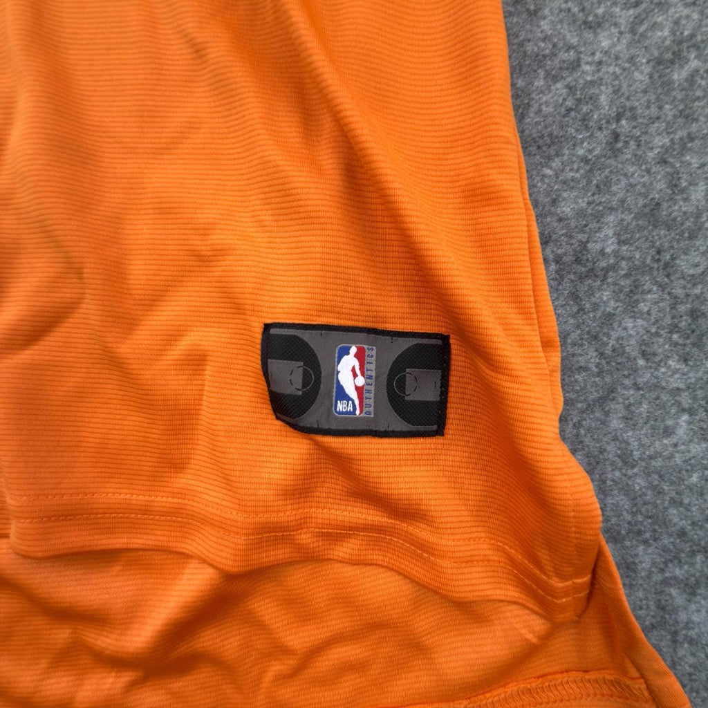Fanatics Women’s NBA Phoenix Suns Devin Booker Short-sleeved Jersey in Orange