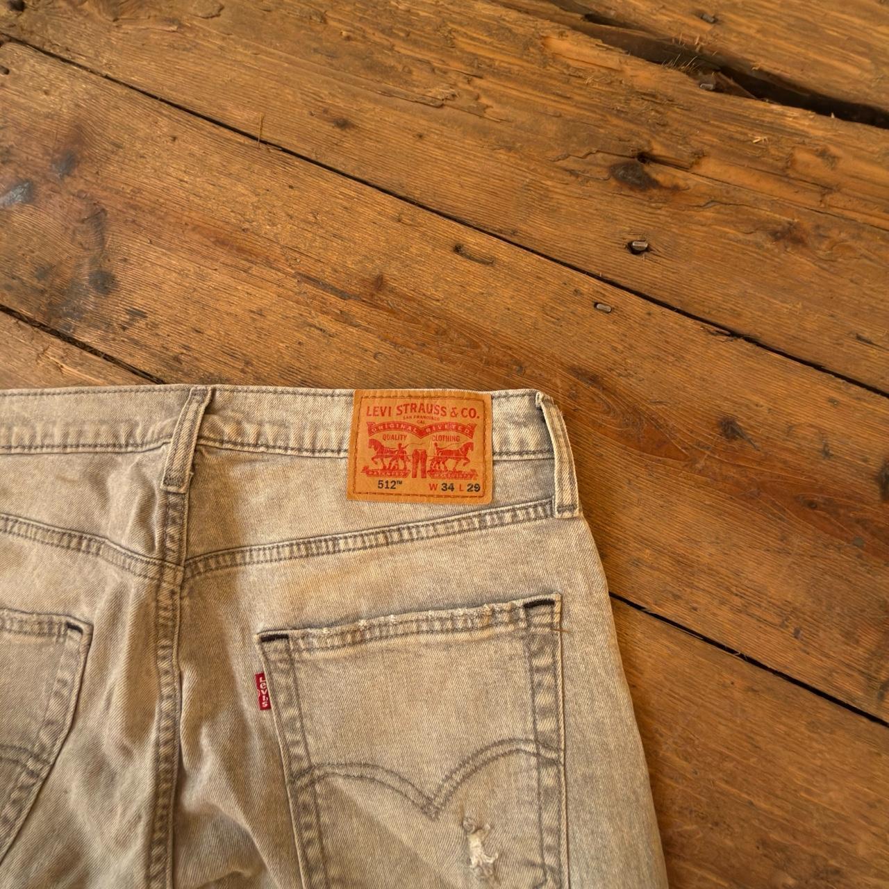 Levi's 512 Light Wash Distressed Jeans with Frayed Hem W34 L29