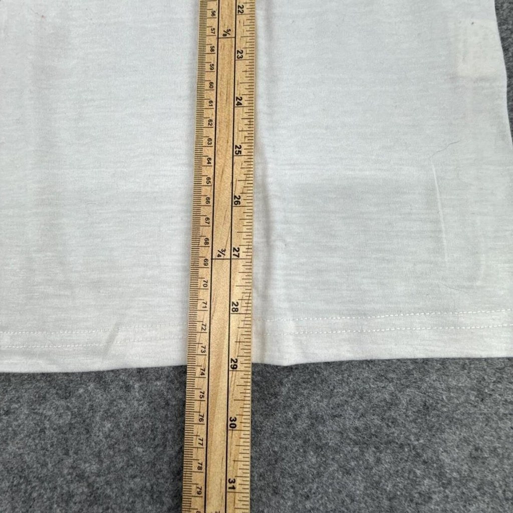 White graphic tee with multi-coloured design