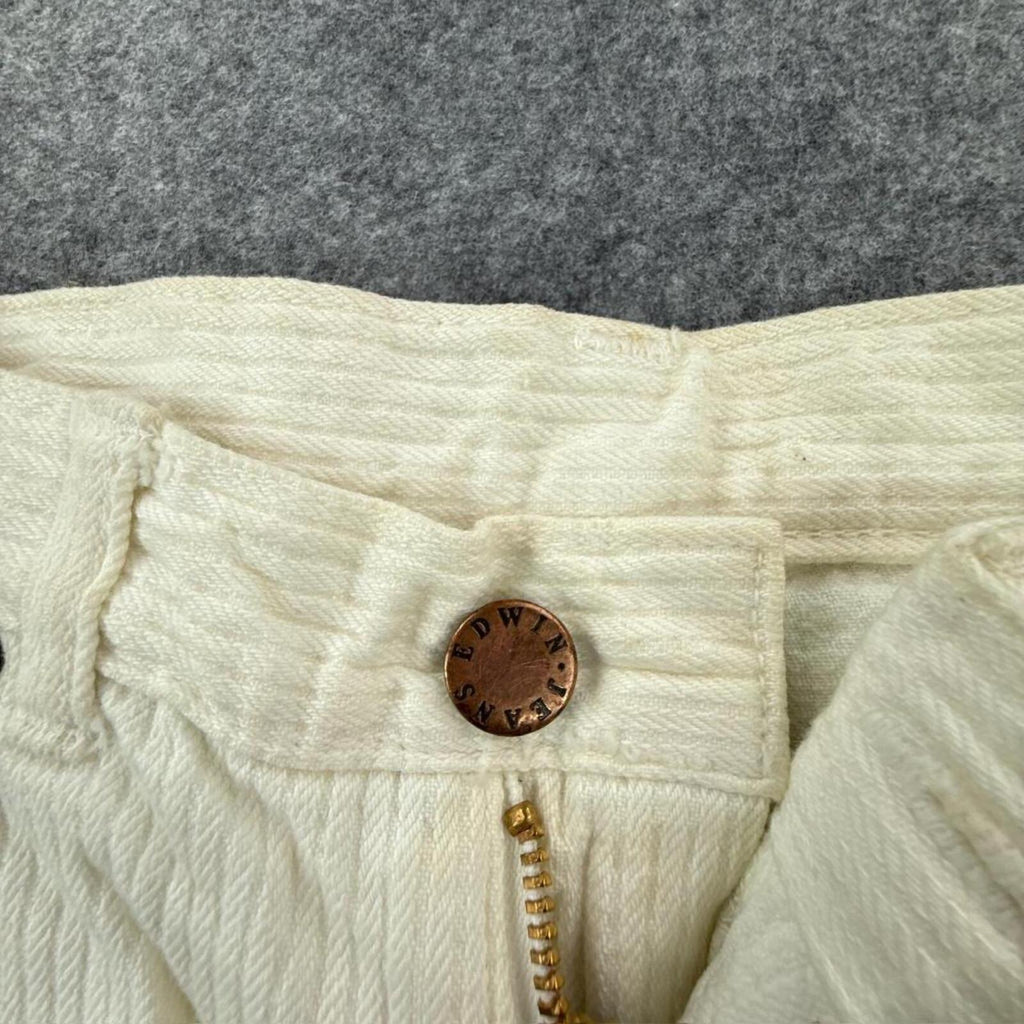 White corduroy straight leg trousers